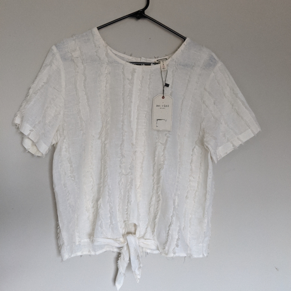 Anthropologie feathered cream top